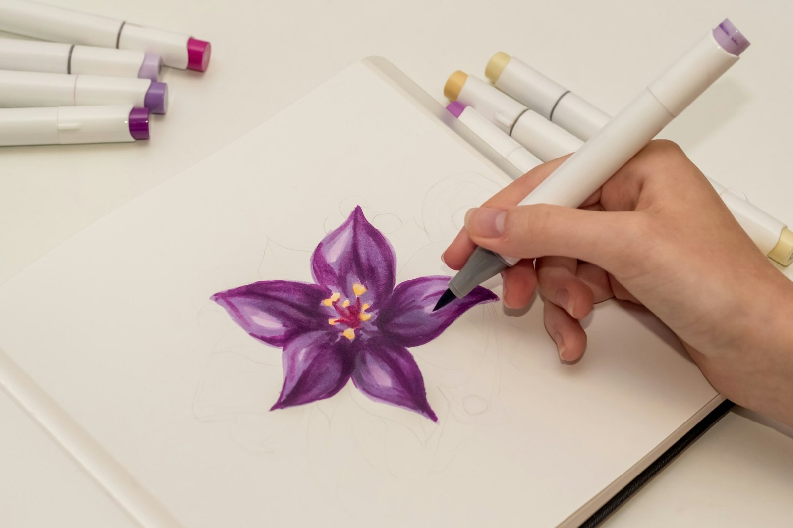 How to Draw a Flower in 5 Fun and Easy Ways Hand drawing purple flower sketch with alcohol based sketch drawing markers.